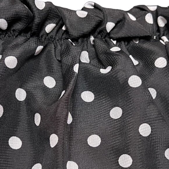 Short black and white polka dotted skirt with attached black leggings - Picture 2 of 3